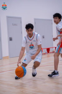 Harbor Sports Academy player dribbling the ball down the court