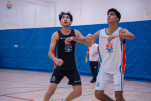 Harbor Sports Academy players contesting the ball during a tournament match